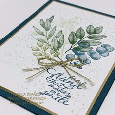 a close up of a card with leaves on it