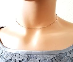 "Beautiful simple and chic necklace~ DESCRIPTION: - This listing is for the beaded gold/ rose gold/ silver necklace. - 16k gold/ rose gold/ silver plated - Handcrafted in the USA and beautifully packaged for you. LENGTHS: Use a string to measure the part of the neck where you would like it to fit, otherwise, it may be too tight if you don't measure the exact length! Comes in 3 sizes for beaded necklace Small : 12\"-14\" Medium : 13\"-15\" Large: 14\"-16\" BLUSH PINK LEATHER NECKLACE / 12-14\" on Party Clavicle Chain Choker In Rose Gold, Party Choker With Clavicle Chain In Rose Gold, Rose Gold Clavicle Chain Choker For Party, Delicate Rose Gold Chain Necklace For Party, Party Rose Gold Choker With Clavicle Chain, Minimalist Rose Gold Choker Necklace, Adjustable Rose Gold Beaded Necklace, Dainty Rose Gold Chain Necklace For Party, Dainty Rose Gold Choker With Delicate Chain