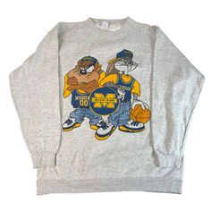 Vintage Michigan  Looney Tunes  Crewneck Sweatshirt Easy 30 day return policy Retro Long Sleeve Tops With Character Print, Throwback Graphic Print T-shirt For Fall, Retro Long Sleeve Sweatshirt With Character Print, Casual Crew Neck Sweatshirt For Fan Merchandise, Sporty Cartoon Print Tops For Fall, Casual Crew Neck Sweatshirt For Fans, Casual Screen Print Sweatshirt For Fans, Casual Sweatshirt With Screen Print For Fans, 90s Style Tops For Fan Merchandise In Fall