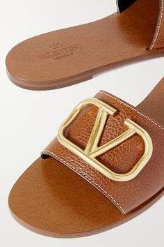 Find VALENTINO Vlogo Textured-leather Slides on Editorialist. Valentino Garavani's slides are topped with the label's 'VLOGO' plaque, which is burnished for an antique effect. They've been crafted in Italy from textured-leather that gets softer over time, so you can comfortably wear them for hours as you wander the local piazzas. Luxury Calf Leather Slides With Leather Footbed, Luxury Slides With Calf Leather Footbed, Luxury Slides With Leather Footbed And Calf Leather, Designer Leather Slides With Leather Lining, Designer Calf Leather Slides With Leather Lining, Designer Leather Slides With Leather Footbed, Luxury Leather Slides With Leather Footbed, Luxury Brown Slides, Designer Brown Slides