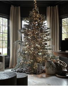 a decorated christmas tree in a living room