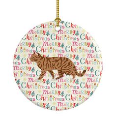 a round ornament with a tiger on it's side and the words merry christmas