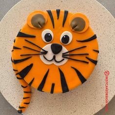 a cake decorated to look like a tiger