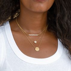 🛍️ ADD 2 ITEMS AND GET AN ADDITIONAL -60% OFF! CODE: MORE60 Looking for trendy layered necklaces? Our three-piece set is designed for a unique boho chic look. Stack them together or wear separately for versatile style. The set includes a pearl beaded choker, a CZ Diamond Pendant necklace, and a personalized coin disc necklace. Perfect for any occasion! A B O U T ∙ I T E M  * Material: High Quality Solid 925 Sterling Silver * Finish: 18K Gold  * Dimensions: Top chain - 14'', Middle chain - 17'', Minimalist Beaded Necklaces For Everyday, Necklace Minimalist Jewelry, Necklace Stack, Necklaces Set, Pearl Beaded Necklace, Necklace Minimalist, Disc Necklace, Multi Strand Necklace