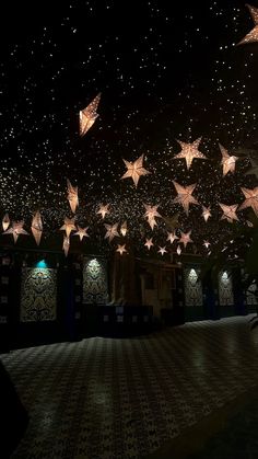 the ceiling is decorated with stars and lights