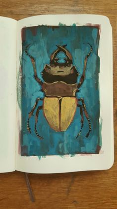 an open book with a painting of a beetle on it's cover and the title,