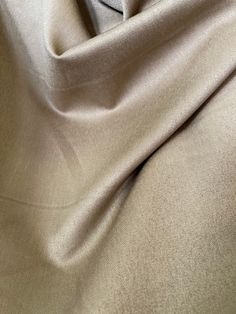 an up close shot of a tan fabric