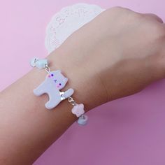 .**o**.✰*o¨oº*. 🎀 D E S C R I P T I O N 🎀 .*ºo¨o*✰.* The most delicious candies have now become lovely jewelry to make your style extra sweet and adorable ヾ(oo)ｼ But be careful, do not eat them ˇд ˇ ｡♥｡･ﾟ♡ﾟ･｡♥｡ More Info ｡♥｡･ﾟ♡ﾟ･｡♥｡ ♫ All the pieces are 100% handmade in clay (fimo!) ♫ They have a glitter finish for a super cute and sparkling effect ヾﾉ .**o**.✰*o¨oº*. 🎀 S H I P P I N G 🎀 .*ºo¨o*✰.* Shipping is 5€ airmail without tracking number worldwide. Italia: raccomandata If you need a tr Kawaii White Bracelet Jewelry, White Kawaii Bracelet Jewelry, Kawaii Style White Bracelet, White Kawaii Beaded Bracelets For Friendship, Handmade White Kawaii Charm Bracelet, Lilac Cat, Kawaii Bracelet, Beads Candy, Cat Bracelet