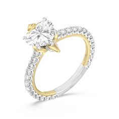 a gold and white diamond engagement ring