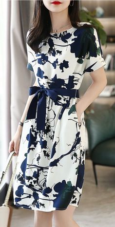 Aesthetic blue and white floral midi dress with long sleeves. For elegant and feminine women. Classy dress below the knee with short sleeves. Spring A-line Dress With Belt, Casual Knee-length Belted Dress, White Belted Midi Dress For Work, Casual Knee-length Dress With Belt, Casual Summer Dress With Belt, Spring Knee-length Belted Midi Dress, Belted Knee-length Midi Dress For Spring, Spring Belted Knee-length Midi Dress, Elegant White Belted Dress For Work