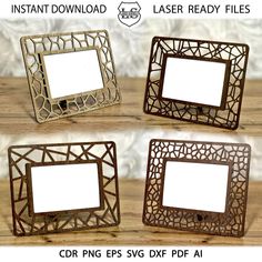 four metal frames sitting on top of a wooden table