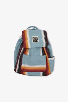 The Senor Lopez Originals backpack is the perfect on-the-go pack to carry all of the important items in your life. All of our backpacks are made from recycled t-shirt fabrics that would have otherwise been thrown in the dump. – Teal/Red/Yellow/Black/White– Pre-shrunk– Machine washable– 50% cotton, 25% polyester, 25% acrylic– Made in Mexico. Cotton Backpack For Outdoor Activities, Standard Cotton Backpack For Outdoor Activities, Blue Cotton Backpack For Daily Use, Casual Blue Backpack With Water Bottle Pocket, Casual Cotton Backpack For Outdoor Activities, Functional Cotton Backpack For Back To School, Blue Cotton Standard Backpack, Blue Cotton Backpack For Travel, Blue Cotton Backpack For Everyday Use