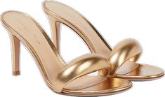 Luxury Gold Mules With Padded Heel, Luxury Gold Mules For Spring, Elegant Gold Slides For Spring, Luxury Gold Open Heel Mules, Designer Gold Mules With Padded Heel, Luxury Metallic Open Toe Mules, Gold Pointed Toe Mules With Padded Heel, Chic Gold Slides For Spring, Classic Gold Heels With Single Toe Strap