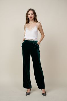 A pair of velvet pants will always look right when getting dressed up in the cooler months. This one's done in a wide-leg silhouette that's polished yet comfortable, elasticized at the back waistband for a precise fit. Go plush from head to toe by adding our velvet blazer on top. AVAILABLE IN PLUS •Zip fly •Slant front pockets •Wide-leg silhouette •Elasticized back waistband •Welted back pockets DIMENSIONS •Standard: 29" Inseam Length Item number 73389 90% Polyester 10% Spandex Green Wide Leg Pants For Formal Fall Occasions, Chic Wide-leg Velvet Pants, Formal Green Wide Leg Pants For Fall, Elegant Straight Velvet Pants, Chic Velvet Trousers, Chic High-waisted Velvet Pants, Elegant Velvet Pants For Night Out, Green Wide-leg Pants For Formal Occasions, Loosely Fitted Green Wide Leg Pants For Fall