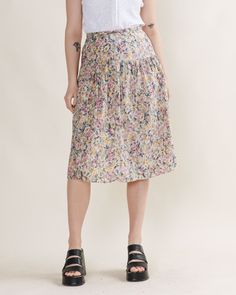 ROMANTIC MIDI SKIRT WITH PASTEL FLORAL PATTERN SIZE S WAIST MEASURED 13.5IN Material unknown, seems to be cotton  Model usually wears size S/M and is 168cm tall.  Great condition, keep in mind that it is used item and signs of natural wear/age might appear, check pictures for more. If you have any questions about item don't hesitate to message us. When buying from HungerVintage you support small sustainable business.  Thank you! Floral Print Cotton Midi Skirt, Cotton Midi Skirt With Floral Print, Cotton Floral Print Knee-length Skirt, Knee-length Cotton Skirt With Floral Print, Retro Cotton Summer Skirt, Retro Cotton Skirt For Day Out, Spring Cotton Lined Skirt, Retro Style Cotton Flowy Skirt Bottoms, Vintage Cotton Midi Skirt