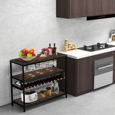 a kitchen with an island and wine rack in the center, filled with fruit on the counter