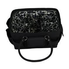 a black and white flowered bag with multiple compartments