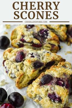 blueberry scones with fresh cherries on top and the words cherry scones above it