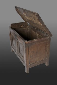 an old wooden chest with the lid open