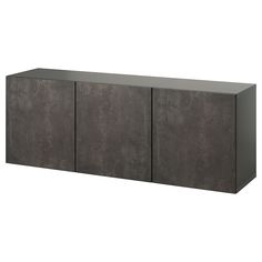 the sideboard is made out of concrete and has three doors on each side,