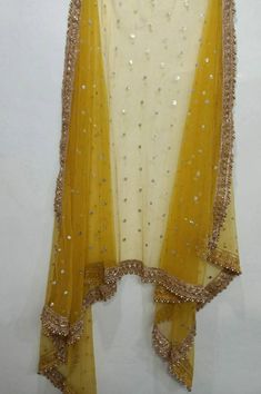 Indian dupatta for women wedding mustard yellow embroidered net. Size: Dupatta is 100 inches (2.5 meter) long and 40 inches (1 meter) wide. Length of this dupatta can be customized as per your requirement. Fabric and work: Sequins embroidered net fabric with lace border. Delivery time: This dupatta will take 3-4 days to produce after we have received your order. While ordered with standard shipping it takes around 2-3 weeks in transit after we dispatch it. You can order with a shipping upgrade, Net Dupatta Designs, Dupatta Designs Ideas, Duppattas Designs Ideas, Wedding Wear Indian, Kameez Lehenga, Yellow Dupatta, Haldi Dress, Lehenga Dupatta, Bridal Dupatta