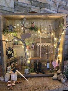 a doll house with lights and decorations on it