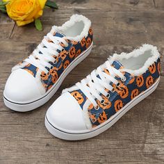 Women's Ghost Face Pumpkin Print Sneakers: Spooktacular Halloween Flat Fall Canvas Shoes For Streetwear With Round Toe, Fall Streetwear Canvas Shoes With Round Toe, Cotton Low-top Sneakers For Fall, Fall Season Low-top Canvas Shoes, Fall Cotton Lace-up Sneakers, Lace-up Canvas Shoes For Fall Streetwear, Lace-up Canvas Shoes For Streetwear In Fall, Fall Lace-up Canvas Shoes For Streetwear, Casual Halloween Sneakers With Rubber Sole