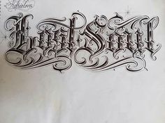 an old fashioned tattoo design with the word's name written in cursive writing