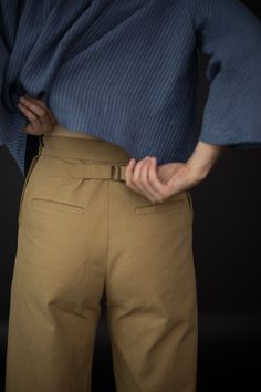 A pair of 'sailor' inspired wide leg trousers, featuring back welt pockets and front pockets with button openings. All seam allowances are 1.5cm unless stated otherwise and are included in the pattern. Level: Intermediate. Suitable fabrics - medium weight woven fabric such as cotton twill, denim, corduroy, light to medium weight woollens and linen. Sizing: This is a multisize pattern that is available in two size ranges: UK 6-18 or UK 18-28. See sizing table for body measurements, finished garme Sailor Trousers, Winter Sewing, Trouser Pattern, Merchant Mills, Merchant And Mills, The Fold Line, Pants Sewing Pattern, Fabric Pictures, Paper Sewing Patterns