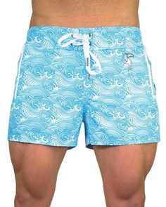 This modern and sleek design will make you the envy of other beachgoers – Make Waves Blue. Providing ultimate aesthetics and comfort, these swim trunks feature 4-way stretch, flexible fabric and a semi-elastic waistband. To elevate the premium feel of our blue swim trunks, we’ve placed luxe silver hardware to the drawstrings and a raised rubber Tucann logo. Look good and feel comfortable 24/7 with in-built underwear and quick drying capabilities. Think they look great? Wait till you try them on! Blue Swimwear With Built-in Shorts For Surfing, Blue Bottoms For Water Sports During Beach Season, Blue Short-length Swimwear For Poolside, Blue Swimwear With Built-in Shorts For Vacation, Blue Swim Trunks With Built-in Shorts For Water Sports, Beachy Stretch Swim Trunks For Pool, Light Blue Swim Trunks For Summer Beachwear, Blue Sports Swimwear For Summer, Light Blue Swim Trunks For Summer