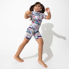 Unleash your little one’s inner hero with these Wonder Woman™ Short Pajamas by Bellabu Bear! Featuring vibrant, action-packed comic graphics of Wonder Woman and her Girl Squad, these pajamas are perfect for empowering bedtime. The ideal blend of comfort, function, and safety—for warmer weather! Designed with your little one in mind, these luxurious pajamas offer the ultimate in softness and flexibility for all body types, while prioritizing skin health. National Eczema Association Seal of Accept Playful Character Print Sleepwear, Playful Fitted Sets With Character Print, Playful Character Print Sleepwear With Short Sleeves, Fun Multicolor Sets With Character Print, Playful Multicolor Character Print Sets, Fun Graphic Print Sets For Playtime, Fun Multicolor Sleepwear For Playwear, Multicolor Character Print Short Sleeve Sleepwear, Multicolor Short Sleeve Sleepwear With Character Print