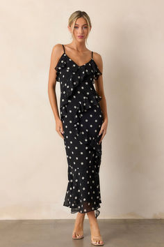 Dance under the moonlight in our Mystic Moon Black Polka Dot Ruffle Maxi Dress. With its playful polka dot pattern and flirty ruffle detail, you're sure to turn heads. The lightweight fabric ensures comfort and easy movement, perfect for any special occasion. Shine bright and stand out in this unique and stylish dress. This black dress features a v-neckline, ruffles throughout, an open leg slit, an self-tie leg ribbon, adjustable spaghetti straps and a flowing silhouette. Under The Moonlight, Mystic Moon, Halter Bridesmaid Dress, Preppy Girls, Moon Black, Rush Dresses, Ruffle Maxi Dress, Dress Bra, Black Dresses Casual