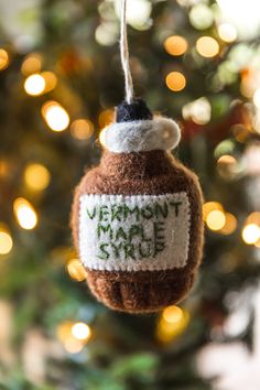 a christmas ornament hanging from a tree