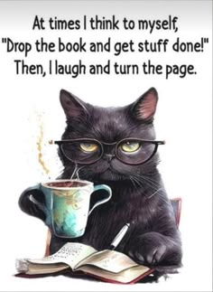 a black cat with glasses sitting next to a coffee cup