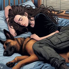 a woman laying on top of a bed next to a brown and black german shepard