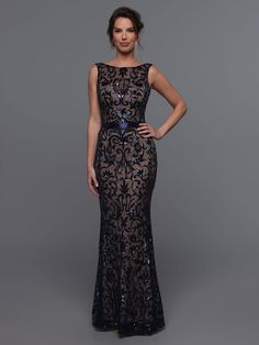 a woman in a long black dress with an open back and sequins on it