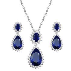 - Necklace is 16" + 3" length,pendant and earrings are the same size : 1.18" x 1.18" - Rhodium Plated to enhance shine and durability - Cubic Zirconia stones are set the pendant and earrings for ultimate sparkle - Comes with a free luxury gift box Teardrop Sapphire Cubic Zirconia Jewelry, Teardrop Sapphire-colored Cubic Zirconia Jewelry, Elegant Pear-shaped Blue Jewelry, Elegant Blue Pear-shaped Jewelry, Sapphire Crystal Dangle Jewelry, Sapphire Cubic Zirconia Dangle Jewelry, Blue Sapphire Dangle Jewelry, Blue Crystal Jewelry With Matching Earrings, Blue Pendant Earrings For Wedding