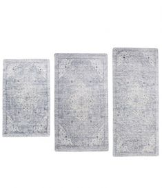 three rugs on a white background