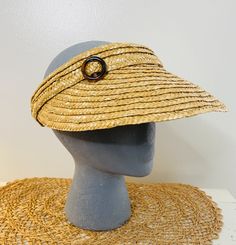 "An absolutely perfect vintage straw sun visor, beach hat, straw with a little celluloid circle clip. Cool festival hat, iconic 60s style.  Brim measures 14\" in diameter, stretches to fit about any head. Good clean condition, BUT A LITTLE YELLOWING ON INSIDE OF BAND." Straw Beach Hat, Straw Hat Beach, Festival Hat, 60s Style, Vintage Sun, Beach Hat, Sun Visor, 60s Fashion, Sun Hats