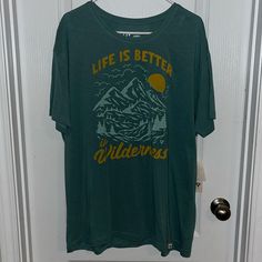 ‘Life Is Better In Wilderness’ Graphic T-Shirt. Nwt, Teal/Yellow Colors. Purchased From The Buckle. Smoke Free Home. Casual T-shirt For Outdoor Spring Activities, Casual T-shirt For Spring Outdoor Activities, Casual T-shirt For Outdoor Spring Events, Casual Green Tops For Outdoor Activities, Green Cotton Top For Outdoor Activities, Green Cotton Tops For Outdoor Activities, Yellow Short Sleeve Tops For Outdoor, Casual Crew Neck Top For Outdoor Activities, Casual Graphic Print Tops For Outdoor Activities