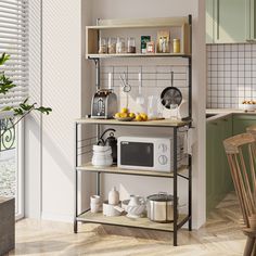 a kitchen area with a microwave, toaster and other items on a shelf in front of the window