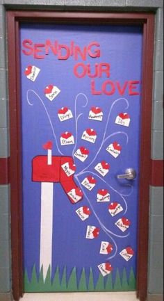 a door decorated with mailboxes and the words sending our love