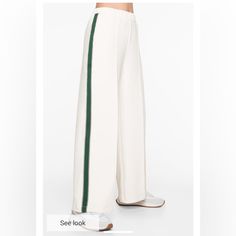 Wide Leg Pant With Side Stripe White - Stripe Is Dark Green Size Small So Cute Just Did Not Fit Me Sadly Tagged Zara For Exposure - Oysho Is An Amazing European Brand White Summer Bottoms With Elastic Side Panels, Trendy White Relaxed Fit Wide Leg Pants, White Relaxed Fit Wide Leg Pants, Trendy White Wide Leg Pants Relaxed Fit, White Wide Leg Loungewear Pants, Trendy White Stretch Wide Leg Pants, Trendy Stretch White Wide Leg Pants, White Bottoms With Elastic Waistband For Work, White Elastic Waistband Bottoms For Work