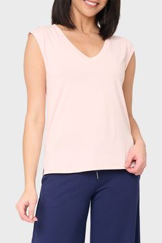 This soft and drapey knit top can easily be dressed up or down and is sure to become your favorite V-Neck of the season. 74% Modal | 26% Polyester Delicate Wash Cycle, Dry Flat. Length 24" (size small) Sabrina is 5'7 and wearing XXS in Blush. Pink V-neck Knit Top, Versatile V-neck T-shirt For Loungewear, Solid Color Feminine V-neck Top, Feminine Crew Neck Top For Loungewear, Spring Everyday Modal Top, Spring Modal Top For Everyday Wear, Solid V-neck Knit Top For Loungewear, Feminine Relaxed Fit V-neck Tops, Feminine V-neck Tops With Relaxed Fit