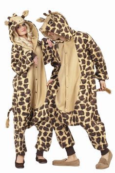 two people in giraffe onesuits standing next to each other