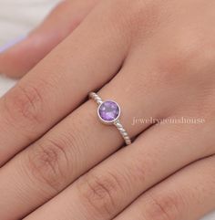 Amethyst Ring, 925 Sterling Silver Ring, Round Gemstone Ring, Dainty Ring, February Birthstone Ring, Solitaire Ring, All Ring Size Available Gemstone Name- Amethyst  Stone Quality - AAA  Weight - 2.30 gm  Stone Shape - As shown in the picture Ring Size - All Ring Size Available  We serve complete 925 sterling silver Jewelry and genuine properties of the stone.  The products are dispatched from the small business from UK. Product Quality and Packaging - Our all products are 925 Silver Stamped which shows that the product is genuine and authentic .The products are dispatched from the small business from UK so you get the product on time and the product packaging comes in bubble foil wrap with all the precautions taken primarily that your product reaches you with zero damage. Properties of Am Sterling Silver Amethyst Ring With Accent Stones, Dainty Stackable Amethyst Ring For Anniversary, Adjustable Amethyst Birthstone Ring, Silver Solitaire Ring Gemstone, Sterling Silver Solitaire Crystal Ring, Sterling Silver Ring With Gemstone, Sterling Silver Ring With Gemstone In Round Band, Sterling Silver Gemstone Stackable Rings, Sterling Silver Birthstone Ring With Gemstone