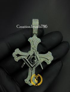 READY TO SHIP Title : Masonic Freemason G Compass with Orthodox Style Cross Pendant Moissanite Test Passer Men's Pendant 925 Sterling Silver, Christmas Gifts   * Handmade Product * - Main Stone: Moissanite - Base Metal: Sterling Silver - Metal Purity: 925  - Metal Finish: 14K White Gold Plated (Black, Yellow, Rose) - Main Stone Clarity: VVS1 / D - Main Stone Creation: Natural (Test Passer) - Stone Color: White - Stone Shape: Round - Gender: Male/ Female This products is entirely nickel-free, to reduce the possibility of rash or skin irritation. Women can wear these all day long without worrying. 🎁To make your decision easier we offer🎁 ✔ 100% Satisfaction Guarantee!! ✔ 14 Days Money Back Guarantee - No Questions Asked. ✔ FREE via shipping to USA🇺🇸 & UK🇬🇧 ✔ 🌎Worldwide Shipping ✔ Handm Silver Cross Jewelry With 17 Jewels, Customized Silver Jewelry With Cubic Zirconia, Diamond White Hallmarked Cross Jewelry, Hallmarked Diamond White Cross Jewelry, Customized Silver Jewelry For Christmas, Custom Iced Out White Gold Jewelry, Customized Silver Symbolic Jewelry, Customized Symbolic Silver Jewelry, Customized Silver Jewelry For Formal Occasions