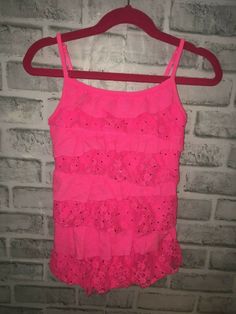 JUSTICE GIRLS - RUFFLE TIERED CAMI TANK  GIRLS 6/7 SHELF BRA INSIDE SEQUINS AND LACE RUFFLES VERY GOOD USED CONDITION  PLEASE CHECK OUT MY STORE FOR MANY MORE THINGS FOR SALE!!!!!!!!!!! BIN#15 Pink Ruffled Straps Tank Top, Pink Ruffled Camisole Top, Pink Ruffled Spaghetti Strap Camisole, Pink Party Tops With Ruffled Straps, Pink Ruffled Straps Top For Party, Pink Ruffled Straps Party Top, 2000s Internet, Justice Clothes, Justice Clothing Outfits