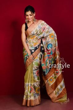 Presenting an authentic hand painted Tussar Kalamkari Saree with blouse piece. The beautiful kalamkari painting has been done on high quality Pure Bishnupuri Zari Tussar Silk, so that the saree gets vibrant look with longevity. You’ll definitely feel the elegance and comfort of this Zari Border Kalamkari Tussar Silk Saree. #HandcraftedTussarSaree #TussarKalamkariSaree #KalamkariSaree #TussarSilkSaree #EthnicWear #TraditionalSaree #TussarKalamkari #HandpaintedSaree Artistic Hand Painted Saree For Festive Occasions, Artistic Hand-painted Saree For Festive Occasions, Festive Artistic Hand Painted Saree, Artistic Hand Painted Festive Saree, Traditional Multicolor Hand Painted Dupatta, Hand Painted Saree For Festivals, Traditional Hand Painted Multicolor Dupatta, Hand Painted Dupatta For Festive Occasions, Traditional Hand Painted Festive Dupatta