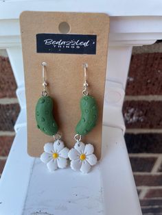 Clay pickle earrings with flower accent.  *Lightweight  *Unique  *Conversation Starter Casual Flower Earrings For Spring, Casual Spring Flower Earrings, Clay Pickle, Pickle Earrings, Pickles, Favorite Jewelry, Jewelry Earrings Dangle, Etsy Earrings, Dangle Drop Earrings